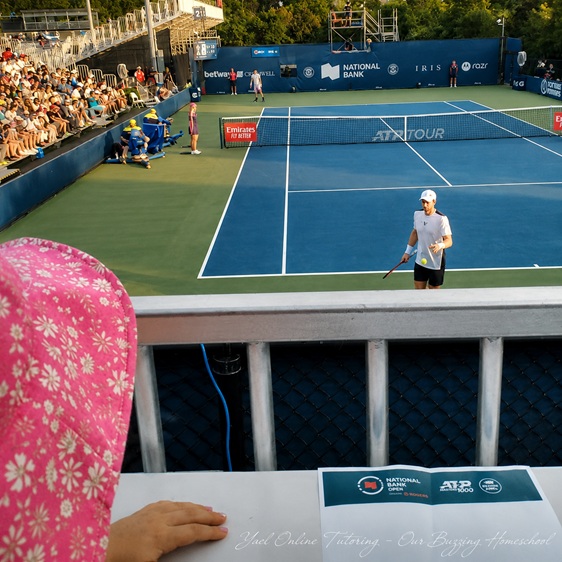 Young girl in the stands watching Andy Murray play at the National Bank Open in Toronto in 2023